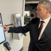 Cllr Darren Rodwell tests touch-screen technology at new sports hub