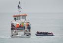 A group of people thought to be migrants are rescued off the coast of Folkestone, Kent in November