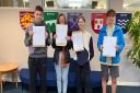 St Ivo students Ben Clinton, Jorja Coxon, Eva Bryant-Hunt and Connor Brookes celebrate opening their GCSE exam results