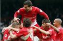 Orient players celebrate Kevin Lisbie's winner against MK Dons (Simon O'Connor)