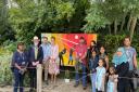 Redbridge mayor Roy Emmett (second from left) unveiled a mural at the event celebrating the work of Friends of Loxford Park.