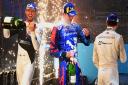 Goodmayes-born racer Alex Lynn is sprayed with champagne by race winner Jake Dennis after finishing third in the London E-Prix on Saturday (July 24).