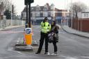 A police cordon remains in place at Seven Kings High Road. Picture: PA