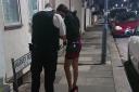 Police officer talking to a sex worker in the Ilford Lane area. Picture: Ellena Cruse
