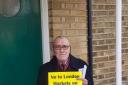 A resident campaigns against the markets coming to Redbridge. Photo: Chris Gannaway,