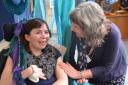 Carly Davies laughing with nurse specialist Katy Chelchowska. Picture: Saint Francis Hospice