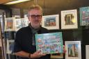 Neil Clayden has been making art and turning it into puzzles at home.
Neil Clayden with his jigsaw puzzl at Wanstead Library,