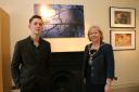 Gideon Knight pictured with his photography exhibition. Gideon Knight and Mayor of Redbridge Cllr Linda Huggett. Picture: Melissa Page