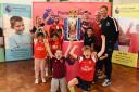 Children at Snaresbrook Primary school enjoying seeing the Premier League cup
