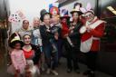 Children and parents enjoy a Mad Hatter themed festival at Redbridge Library