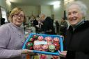 Chris Kerrison and Muriel Karunaratna at the cake sale in St Peters church