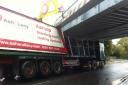 The lorry hit Fairlop Bridge at about 8.25am