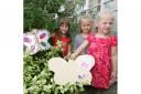 Maddie, Grace and Sylvie Simmons with their recycled butterflies
