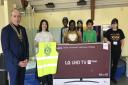 Newham Rotary Club donated a TV to AAA. Picture: AAA