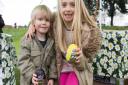 Brother and sister: Alex (aged three) and Eleanor (aged seven) at the Cadbury Easter Egg Trail in Rainham Hall Gardens.
