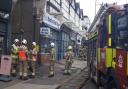 Crews outside a High Road fish and chip shop in Woodford Green where the fire broke out