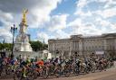 RideLondon riders racing along past The Queen Victoria Memorial and Buckingham Palace.