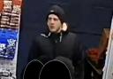 Police want to identify this man in connection with an assault in High Street, Barkingside in 2018