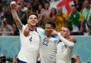 Declan Rice, Jude Bellingham and Phil Foden celebrate during England's 3-0 win over Wales