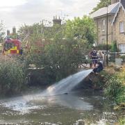 Firefighters from Ramsey Fire Station helped to fill up Horse Pond on August 16.