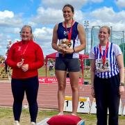 Hunts AC youngster Willow Bedding (left) won silver in the hammer at the England U15/U17 Championships
