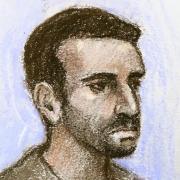 Court artist sketch by Elizabeth Cook of Pc Adam Zaman, 28, a serving Metropolitan Police officer, appearing at Westminster Magistrates' Court on October 27, 2021