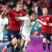 Czech Republic's Tomas Soucek (left) and England's Luke Shaw battle for the ball during the UEFA Euro 2020 Group D match at Wembley Stadium, London. Picture date: Tuesday June 22, 2021.