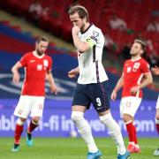England's Harry Kane celebrates scoring their side's first goal of the game during the 2022 FIFA World Cup Qualifying match at Wembley Stadium, London. Picture date: Wednesday March 31, 2021.