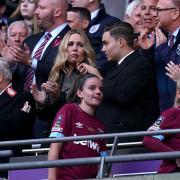 Jack Sullivan (centre) managing director of West Ham United Women appaluds the players with father, West Ham United chairman David Sullivan (left) in the stands after the Women's FA Cup Final at Wembley Stadium, London.