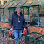 Alan Kingsford working in the hospice garden