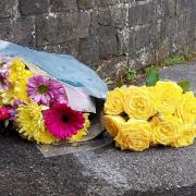 Floral tributes at the scene of the stabbing at the Ashton Playing Fields in Woodford Green