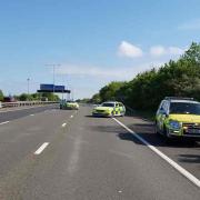 Essex Police and National Highways officers following a collision on the M11 between Chigwell and Epping on May 5, 2022.