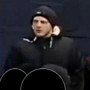 Police want to identify this man in connection with an assault in High Street, Barkingside in 2018