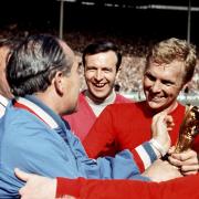 Sir Alf Ramsey, Bobby Moore and Nobby Stiles with the World Cup trophy in 1966.