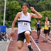 Jacob Ecemagi of Ilford AC in action
