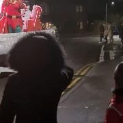 Children watch on as Santa comes to Hainault.