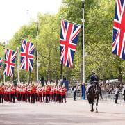 The coffin of Queen Elizabeth II, is carried on a horse-drawn gun carriage of the King's Troop Royal Horse Artillery, during the ceremonial procession from Buckingham Palace to Westminster Hall, London, where it will lie in state ahead of her funeral on