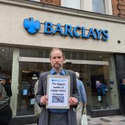 Cedric Knight protests outside Barclays bank on Ilford High Road