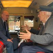 Albert Gibbs talks to Craig Henty in the back of a vintage London ambulance