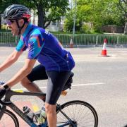 Mal clocking up 100 miles raising more than £2,000 for charity