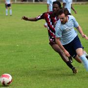 Woodford Town in pre-season action at Clapton Community