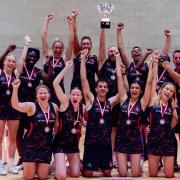 Ziana Butt and Knights Netball Club teammates celebrate winning the National Mixed title. Image: Ben Lumley