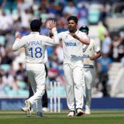 Umesh Yadav celebrates a wicket for India against Australia