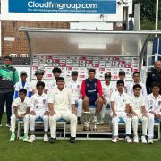 Ilford U14s celebrate winning the Sir Alastair Cook Cup with the man himself.