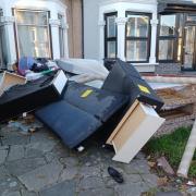 Rubbish dumped in the front garden