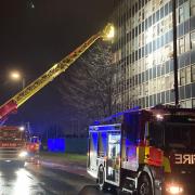 Five people required treatment after a fire tore through an Ilford flat today (December 13)